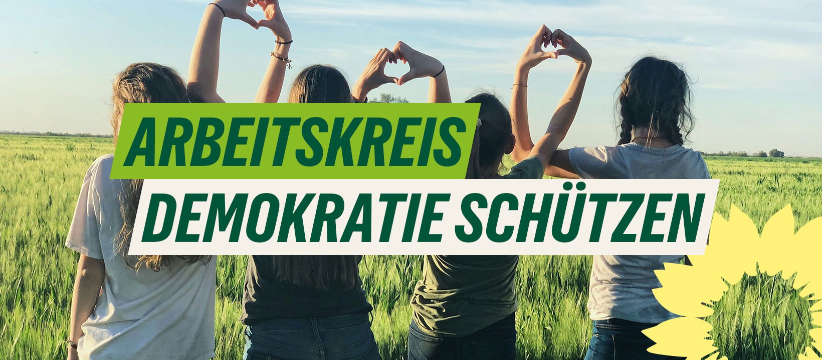 mehrere Menschen die sich zu Gemeinschaft und Zusammenleben bekennen